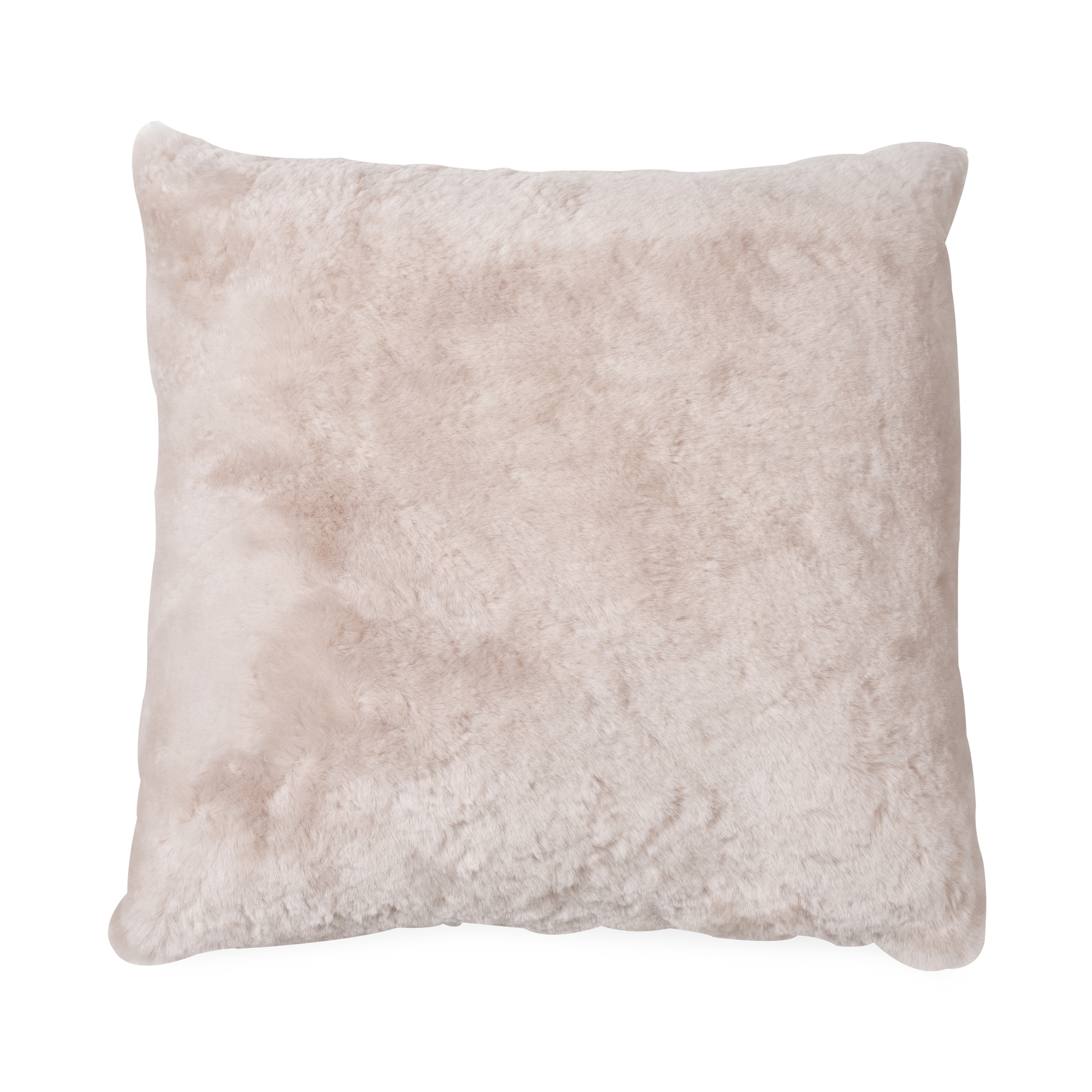 The Shorn Sheepskin Pillow in a oat palette that features a soft and plush texture.