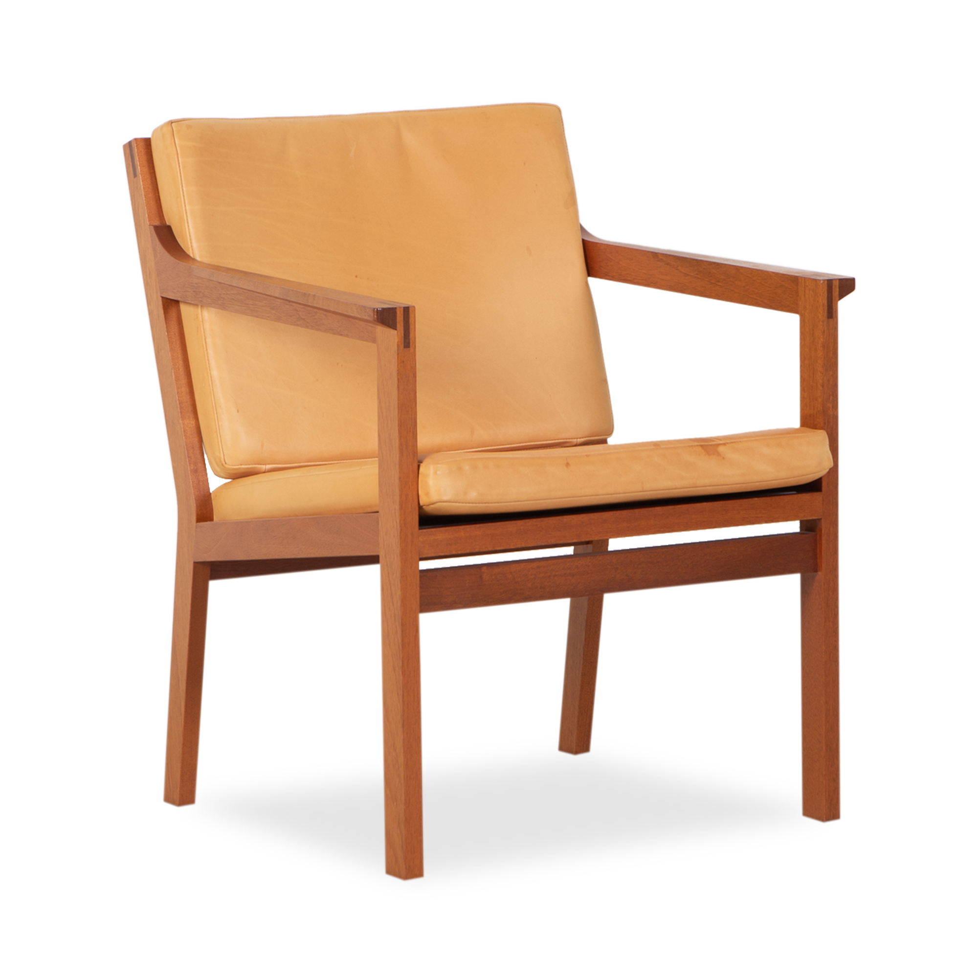 Clean and elegant, this vintage leather armchair was designed by Christian Hvidt for Soborg Mobler, circa 1980s.