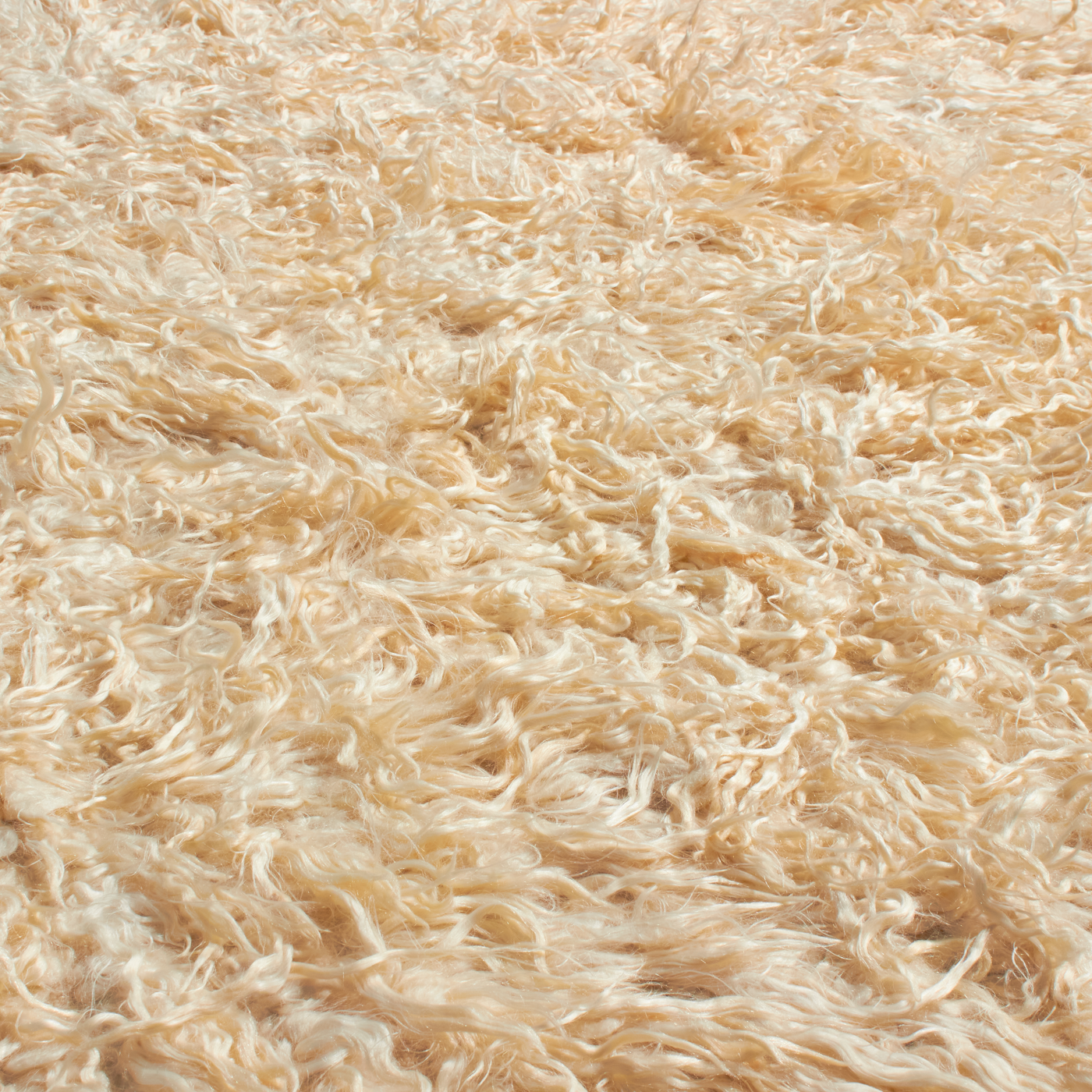 Tulu rugs (pronounced “two-lou”) are thick shaggy silky modern/tribal rugs.