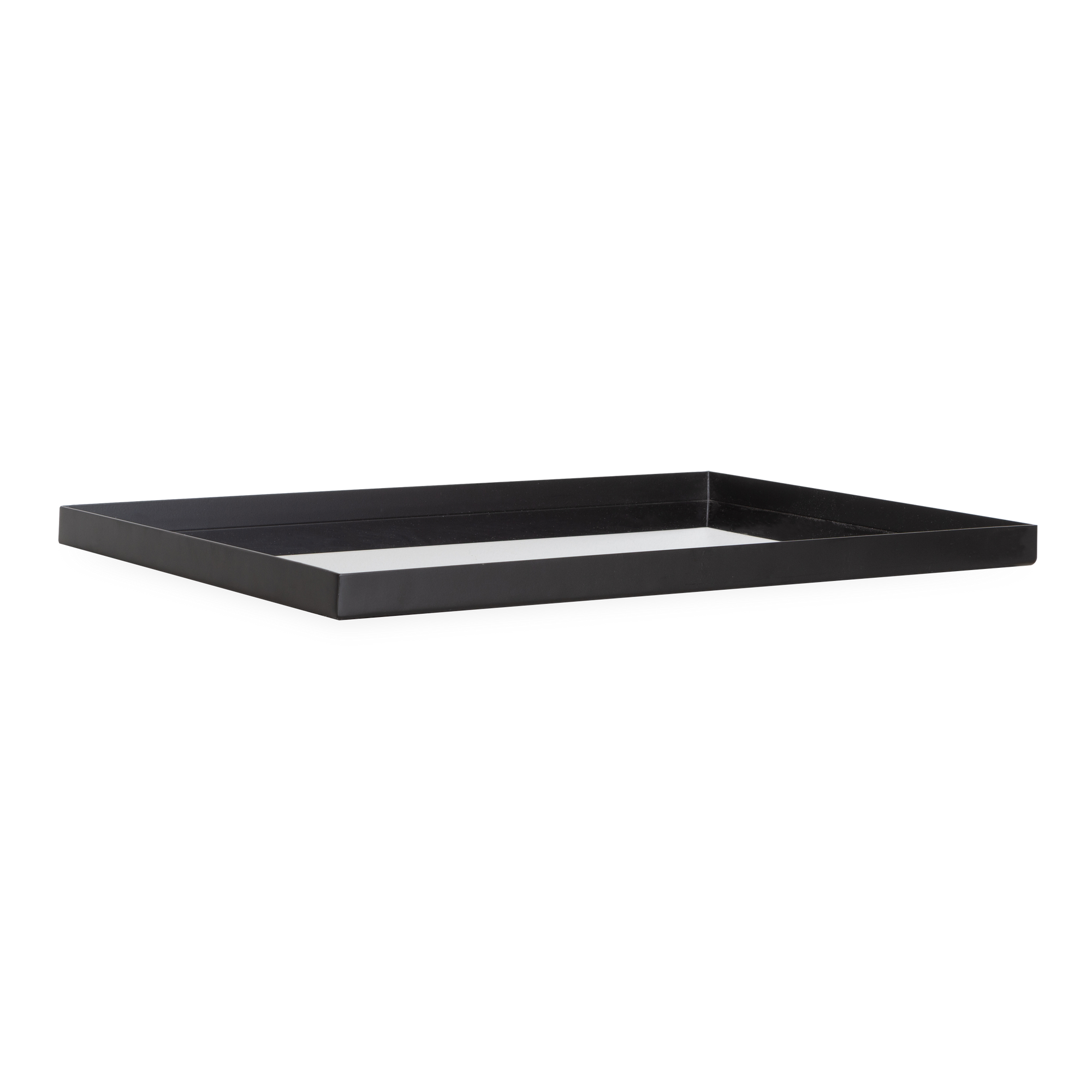 Characterized by its confident presence and its luxurious build quality, the Reflect Rectangular Tray is defined by its clean, sharp lines and its elevation of simple forms.