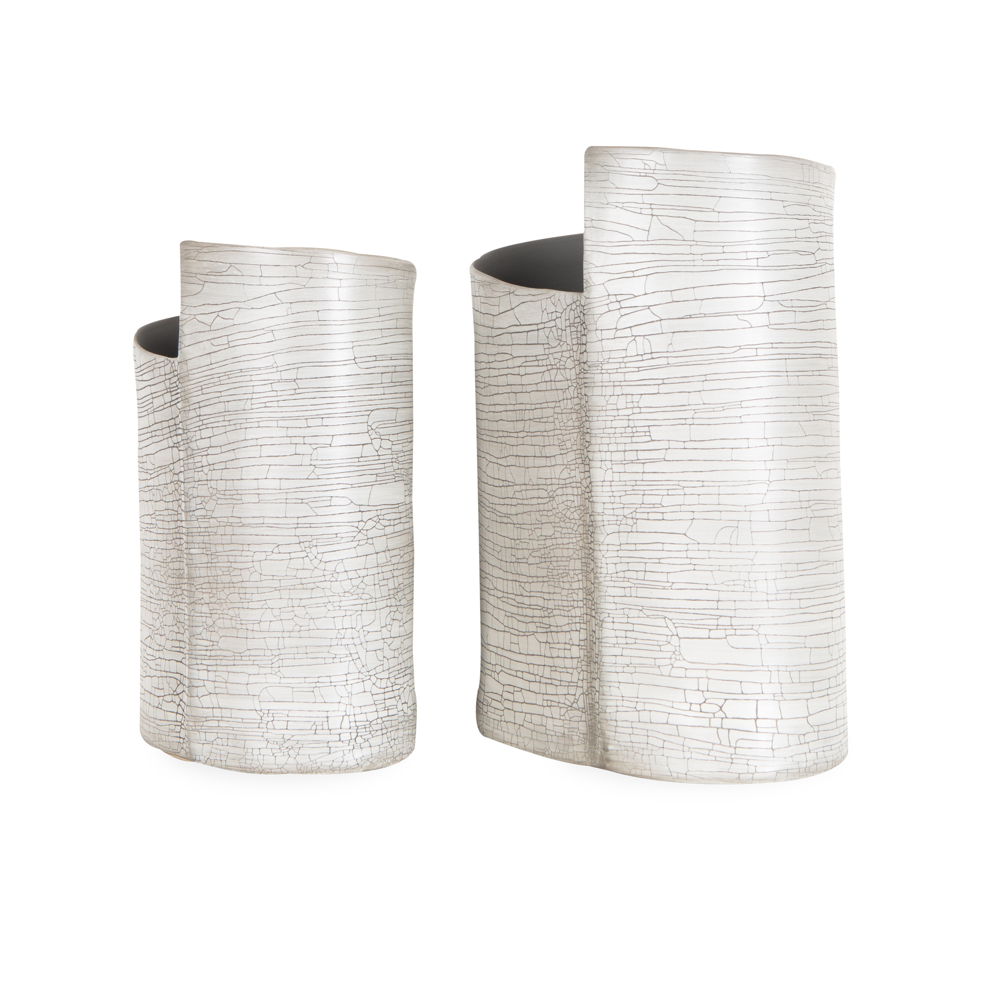 Defined by its intricate white crackle finish, the Torre Vase has a captivating spiraling rim with an eye-catching curved silhouette.