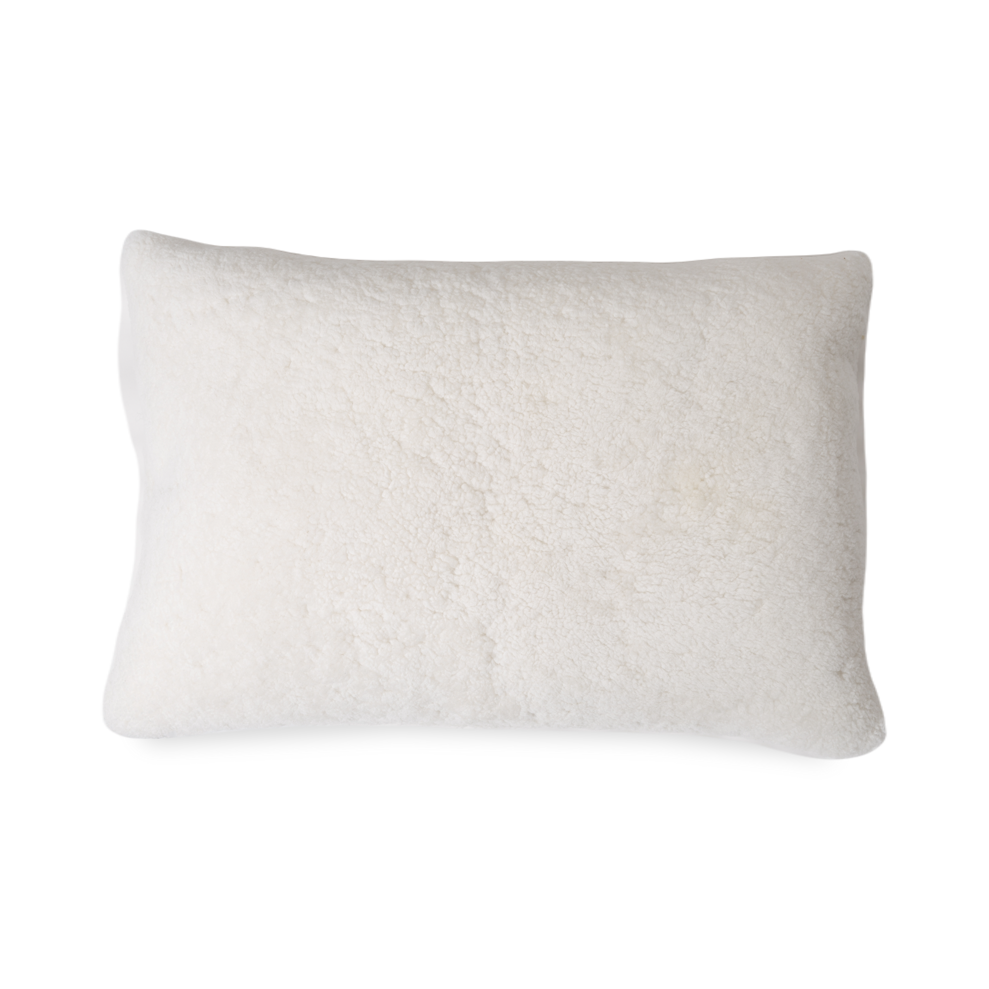 With a welcoming, soft exterior, the Sheepskin Pillow features a neutral beige tone on real sheepskin from Denmark.