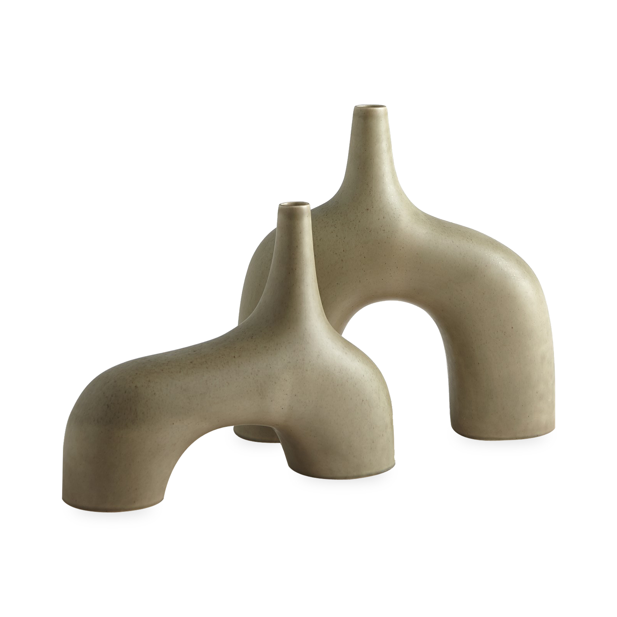 Reminiscent of the 1960's lava glaze ceramics, The Stretch Vases in cream are slip-cast vessels that nest/straddle each other.